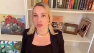 Russian State-TV Protester Fined for Flashing ‘No War’ Sign During Live Newscast